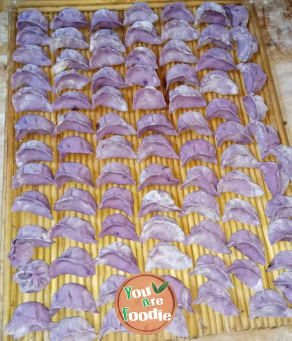 Steamed dumplings with purple potato, dandelion and pork stuffing