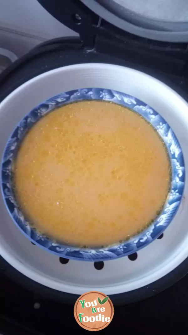 Steamed large bowl of egg soup in rice cooker