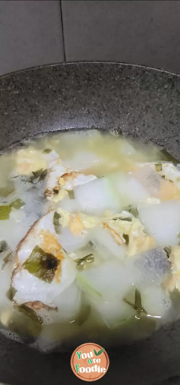 Fried egg, kelp sprouts and winter melon soup