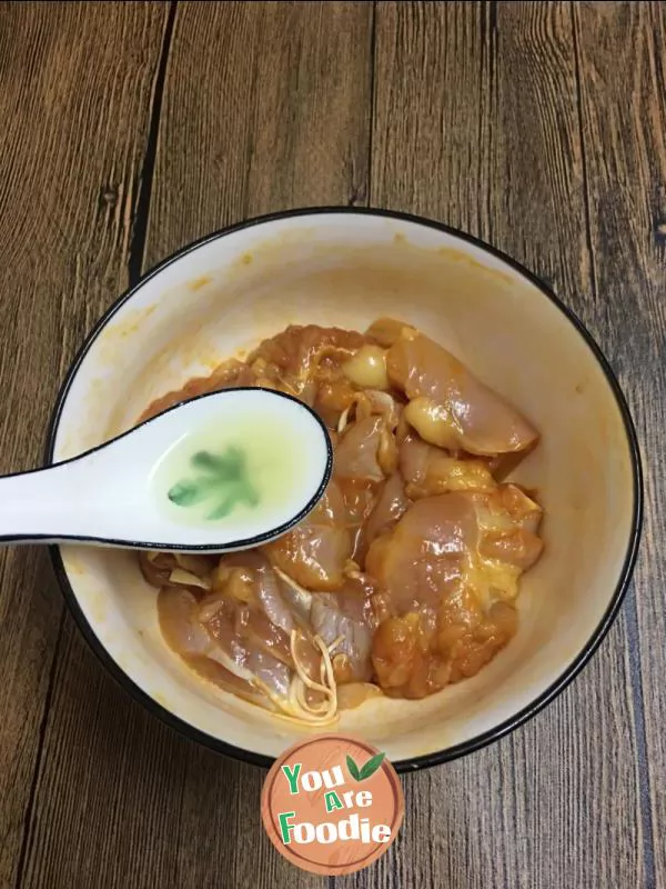 Fried chicken leg in air frying pan