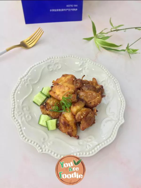 Fried chicken leg in air frying pan