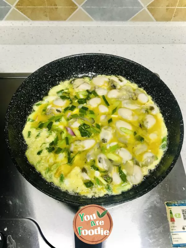 Fried eggs with oysters