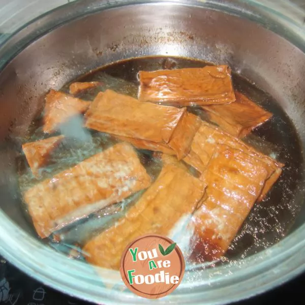 Stir fried shredded tofu with garlic, rice and pepper