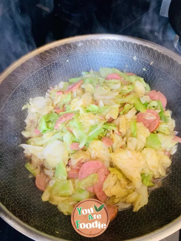 Hand shredded cabbage with ham