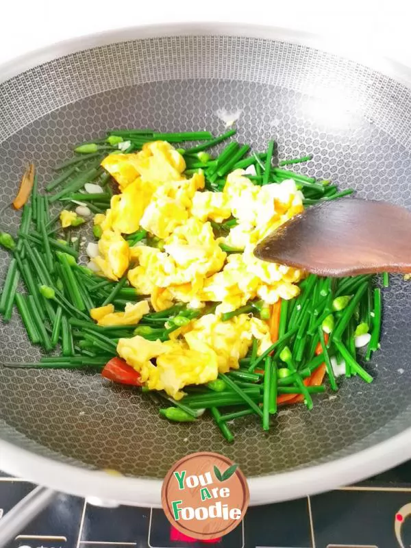 Fried egg with leek flower