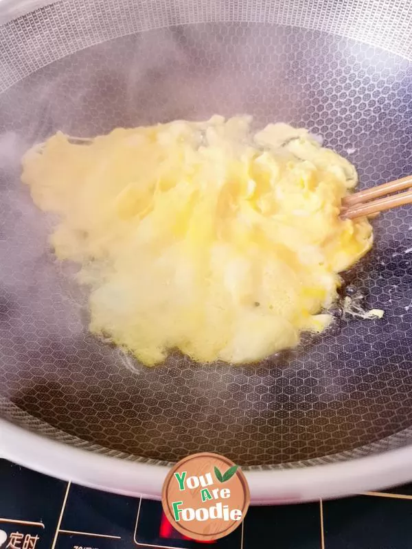 Fried egg with leek flower