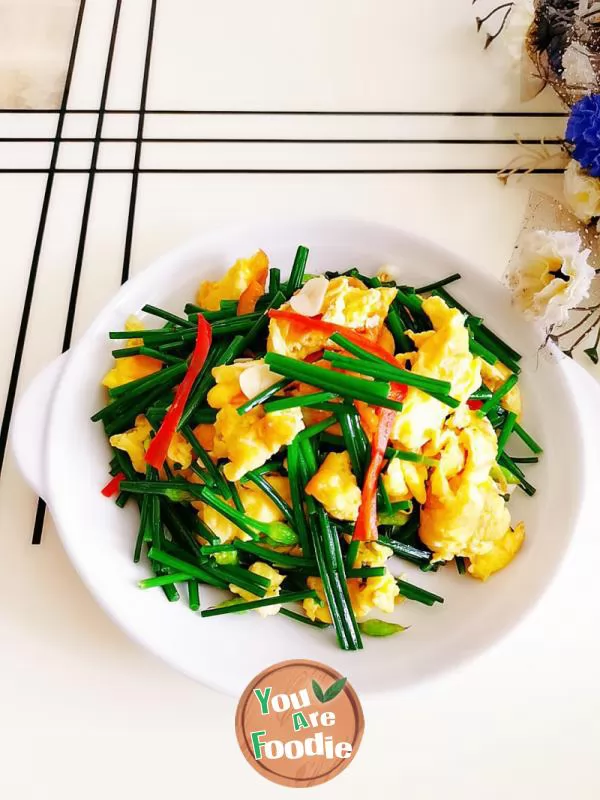 Fried egg with leek flower