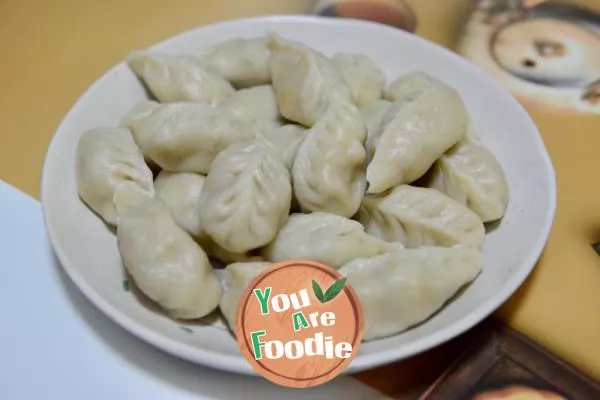 Dumplings stuffed with pork and corn