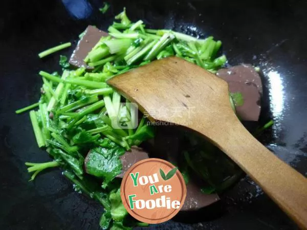 Fried duck blood with celery