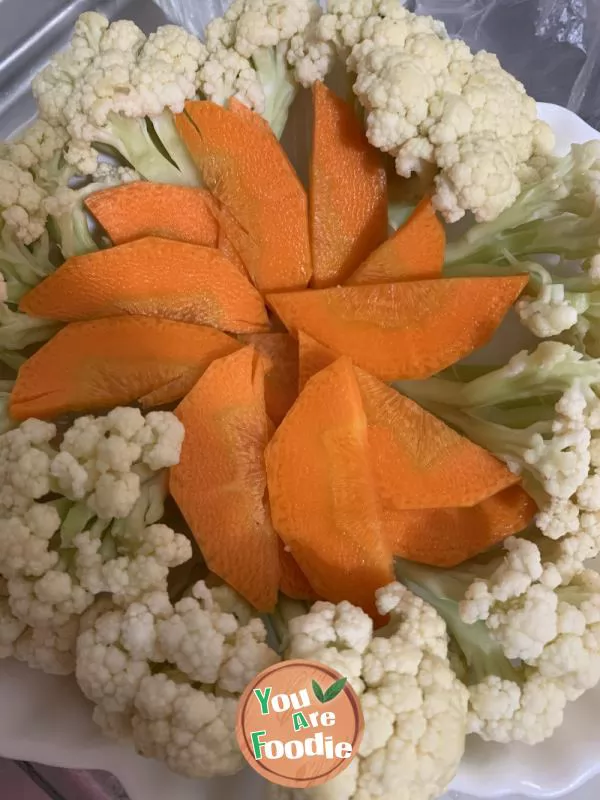 Steamed cauliflower with sausage