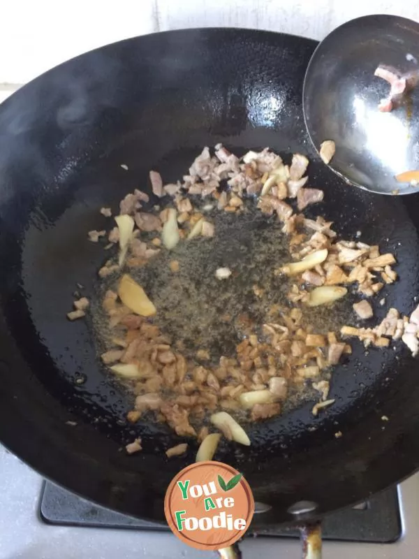 Vegetable noodles in red soup