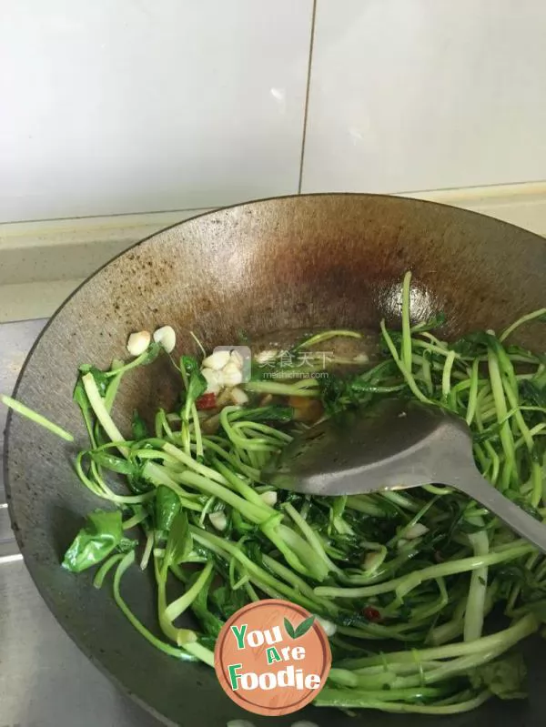 Stir fried chicken feather vegetables