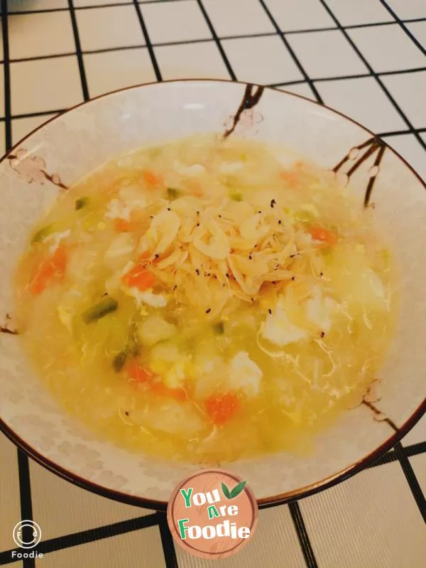 Carrot, green radish, egg noodles and pimple soup