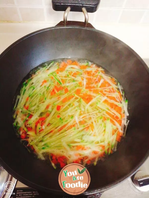 Carrot, green radish, egg noodles and pimple soup