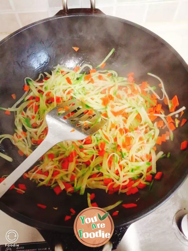 Carrot, green radish, egg noodles and pimple soup