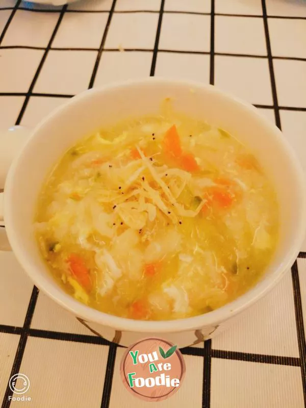 Carrot, green radish, egg noodles and pimple soup