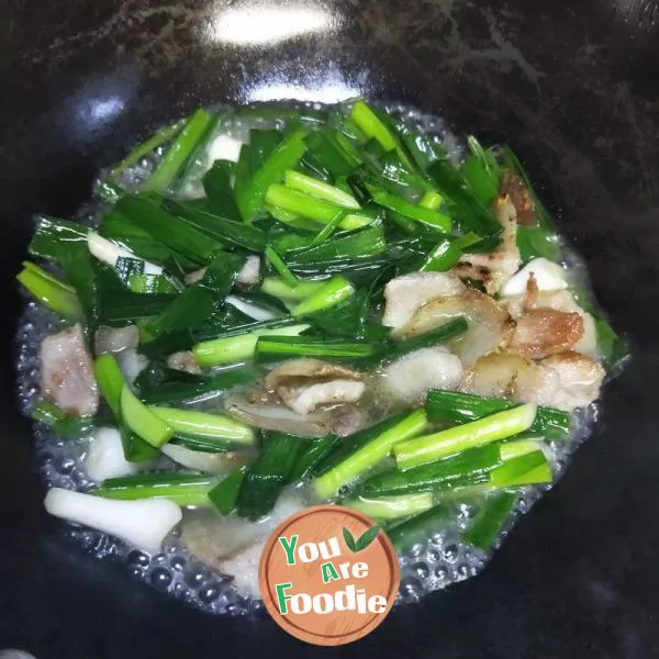 Stir fried Pork with Garlic Shoots