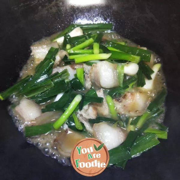 Stir fried Pork with Garlic Shoots