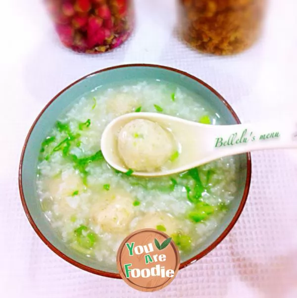 Congee with chicken balls and green vegetables