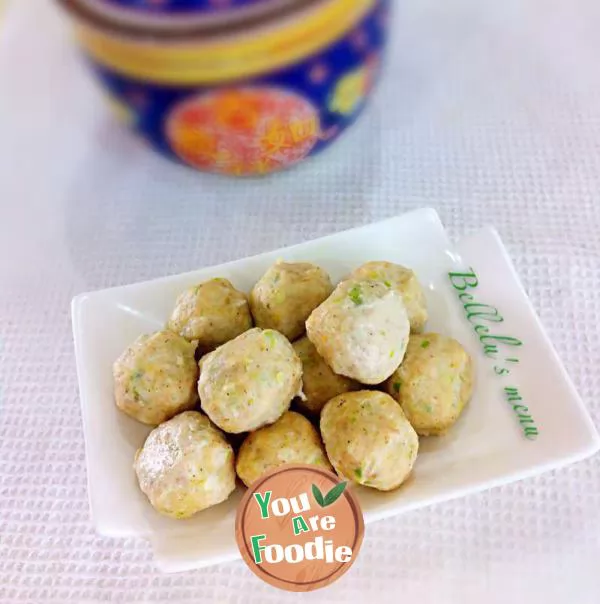 Congee with chicken balls and green vegetables