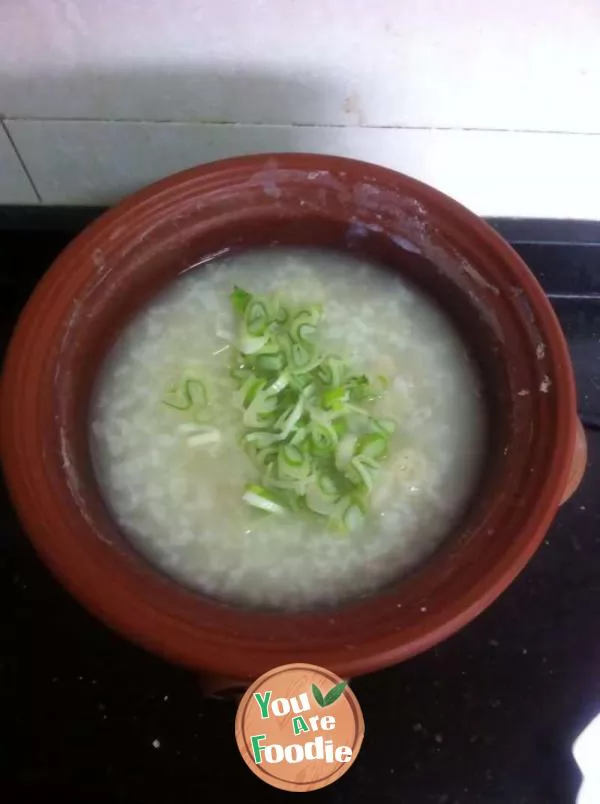 Congee with chicken balls and green vegetables