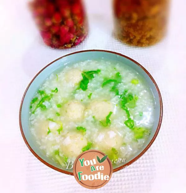 Congee with chicken balls and green vegetables