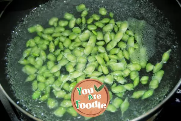 Home cooked dish in early summer - fried wild bamboo with soybean seeds