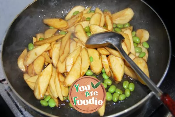 Home cooked dish in early summer - fried wild bamboo with soybean seeds