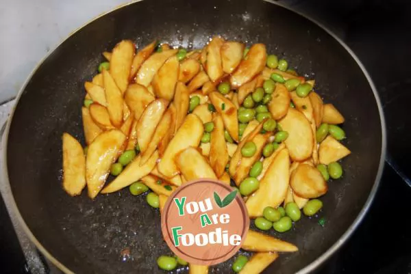 Home cooked dish in early summer - fried wild bamboo with soybean seeds