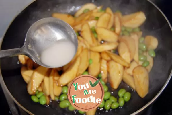 Home cooked dish in early summer - fried wild bamboo with soybean seeds