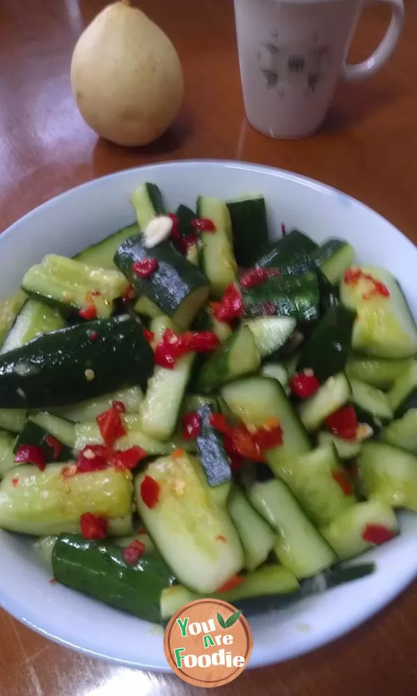 Minced garlic, chopped pepper and cucumber