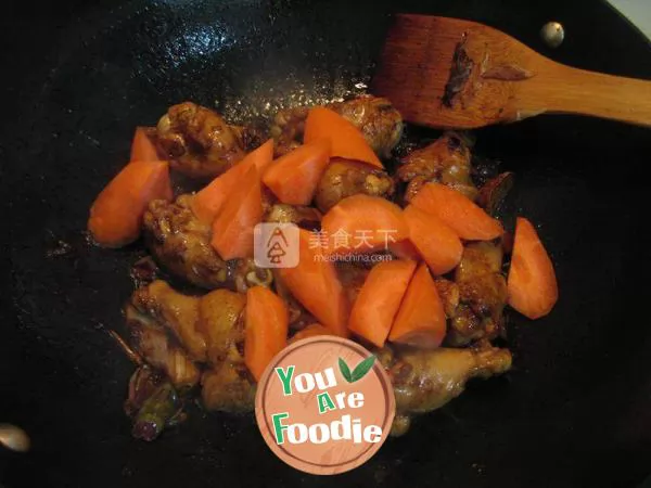 Braised chicken wing root with carrot