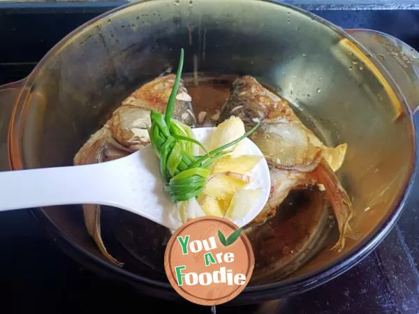 Tofu green fish head soup