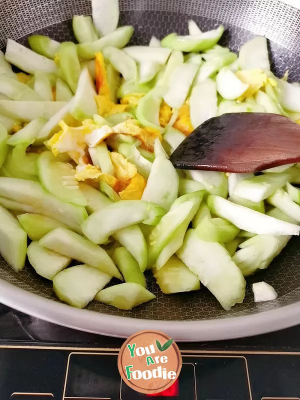 Rice with egg and towel gourd soup