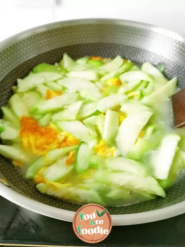 Rice with egg and towel gourd soup