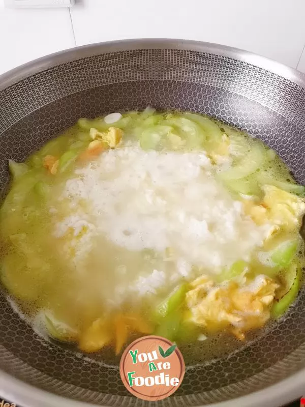 Rice with egg and towel gourd soup