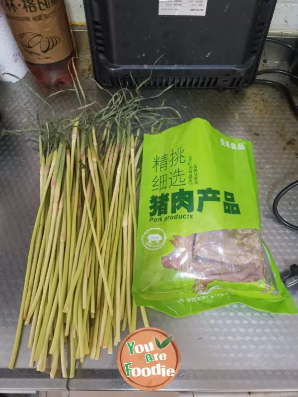 Stir fried pork with garlic sprouts