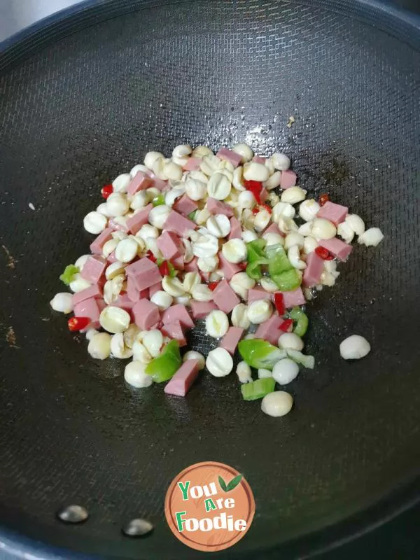 Stir fried green and red peppers with lotus seeds