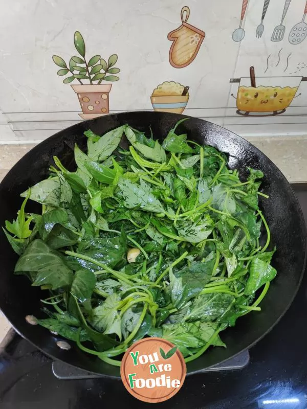 Stir fry sweet potato leaves with chili sauce