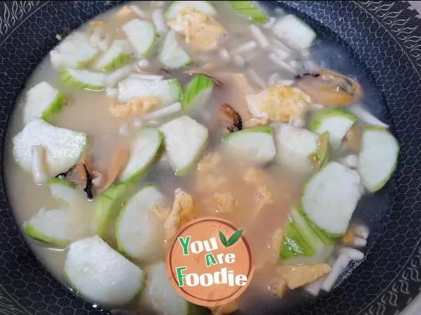 Sponge gourd, tofu, egg, mushroom and mussel soup