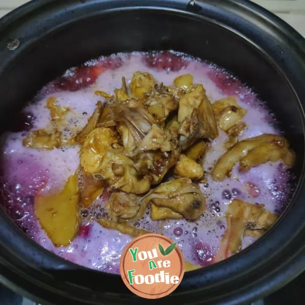 Stewed chicken with fresh red mushrooms