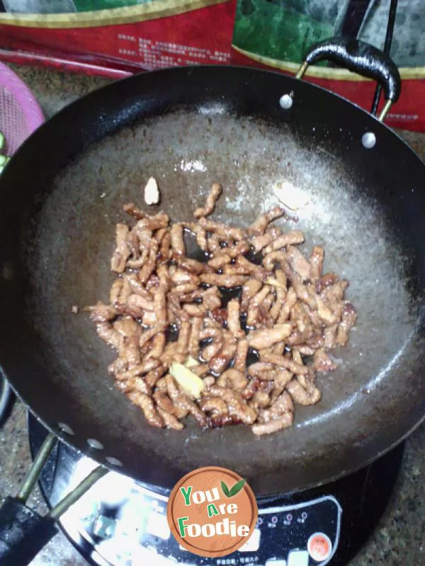 Fried pork with cucumber