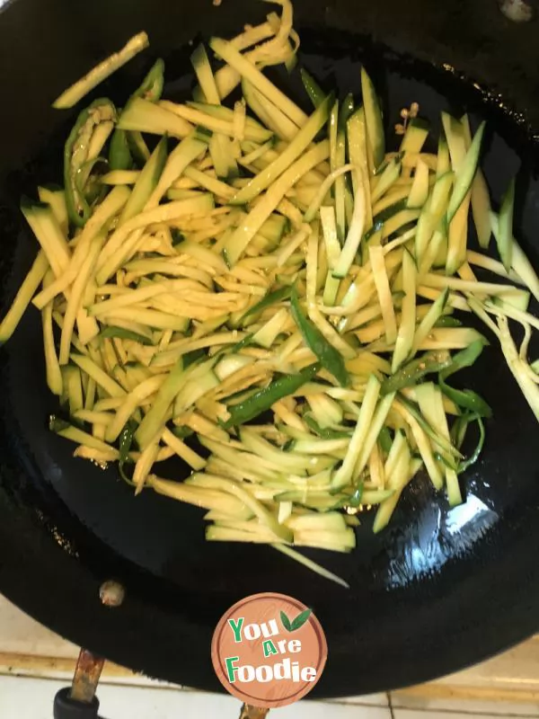 Shredded pumpkin with green pepper