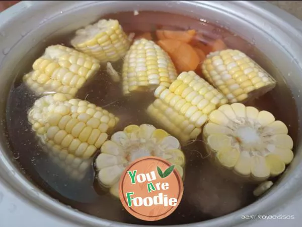 Pork ribs, carrots and corn soup