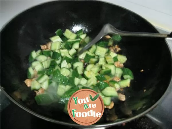 Fried diced cucumber with Laoganma