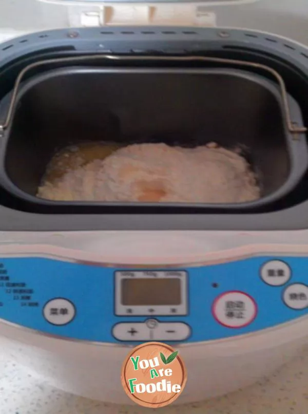 Coconut flavored raisin bread - bread machine version