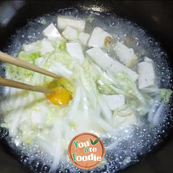 Bean curd, egg and cabbage soup