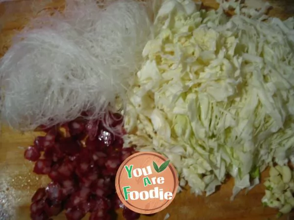 Fried vermicelli with sausage and cabbage