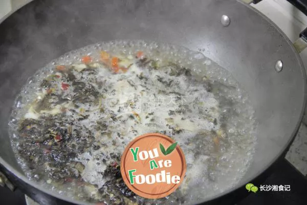 Boiled fish with sweet potato leaves