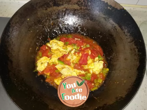 Scrambled egg with tomato and pepper